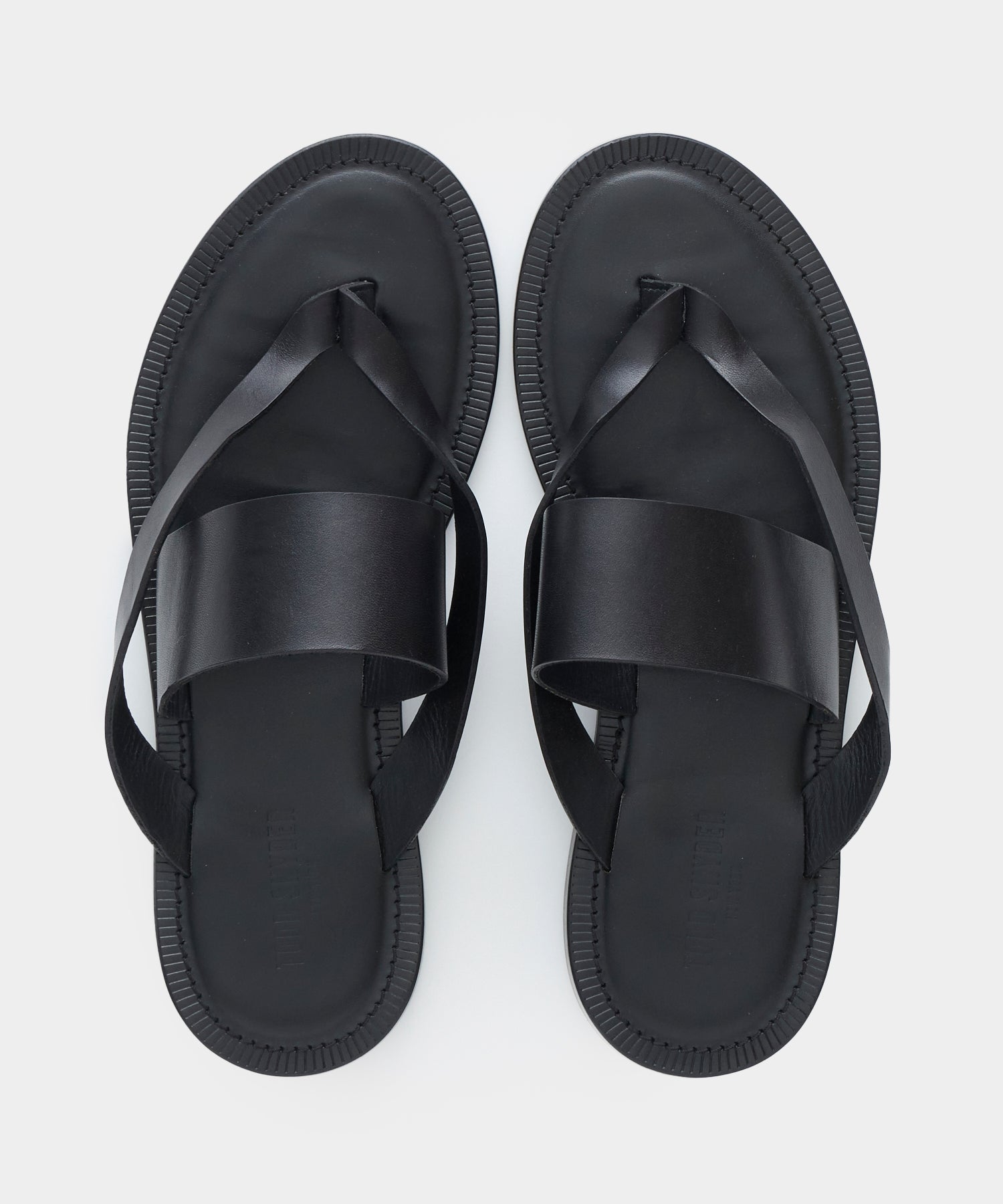 Tuscan Leather Thong Cross Sandal in Black